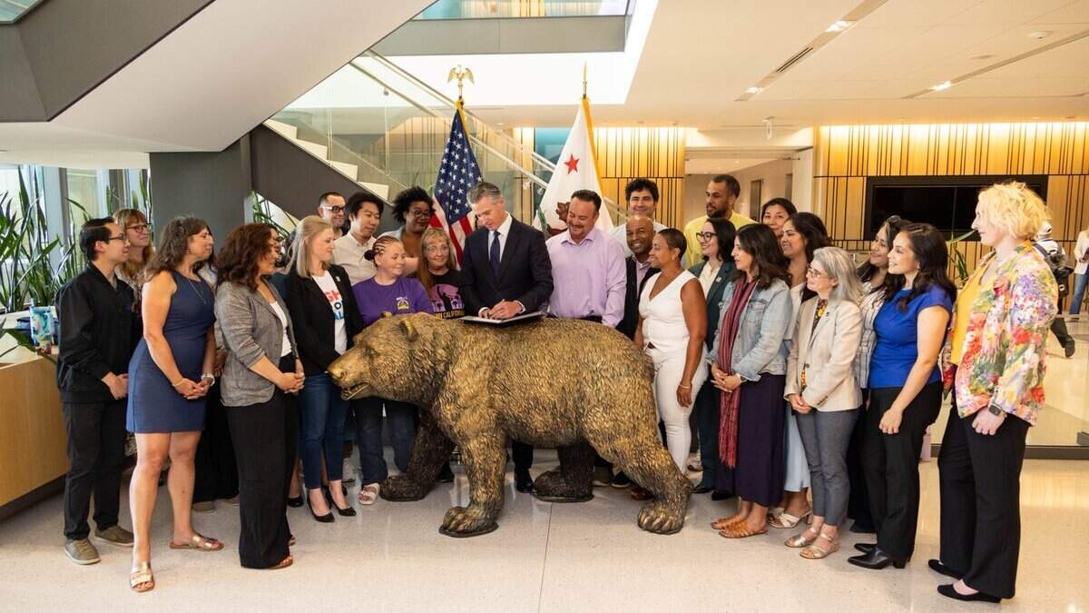 Gov. Gavin Newsom signed the Fair Share from Big Corporations Act alongside SEIU California and Health Access on Wednesday, July 8.