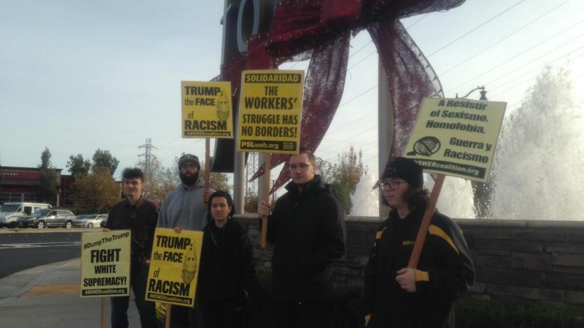 Anti-Trump protesters gather at Roseville Parkway and Galleria Boulevard in Roseville on Sunday, Nov. 27, 2016.