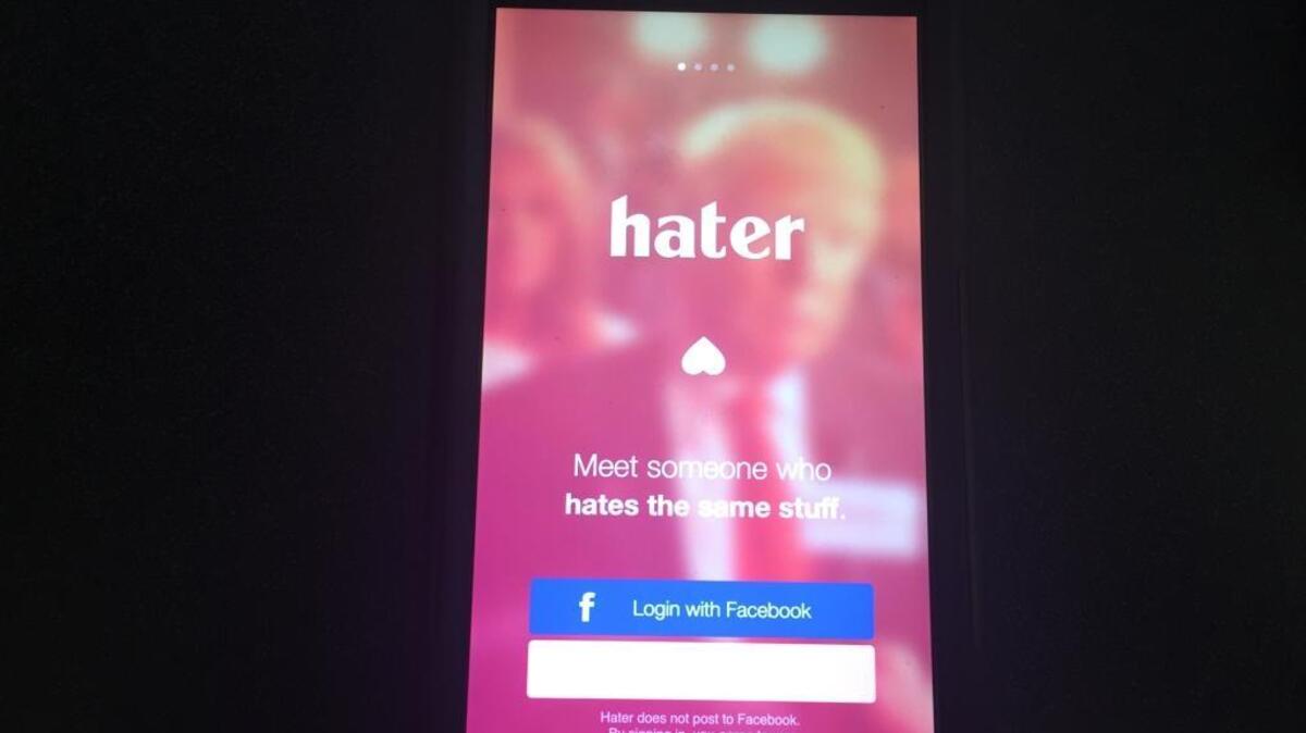 The Hater dating app is displayed on an iPhone. It bills itself as the first app to match people by the things they don’t like.