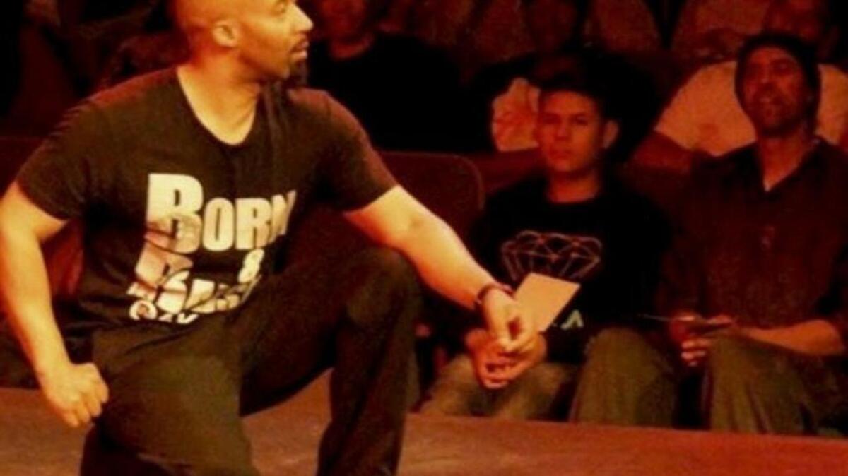 Brandon Hughes performs in his one-man show, “The Absent Father. The Wayward Son.”