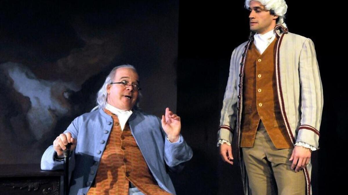 Ted Barton, left, as Benjamin Franklin and Dan Fagan plays his son, William, in Sacramento Theatre Company’s world premiere production “Of Kites and Kings.”