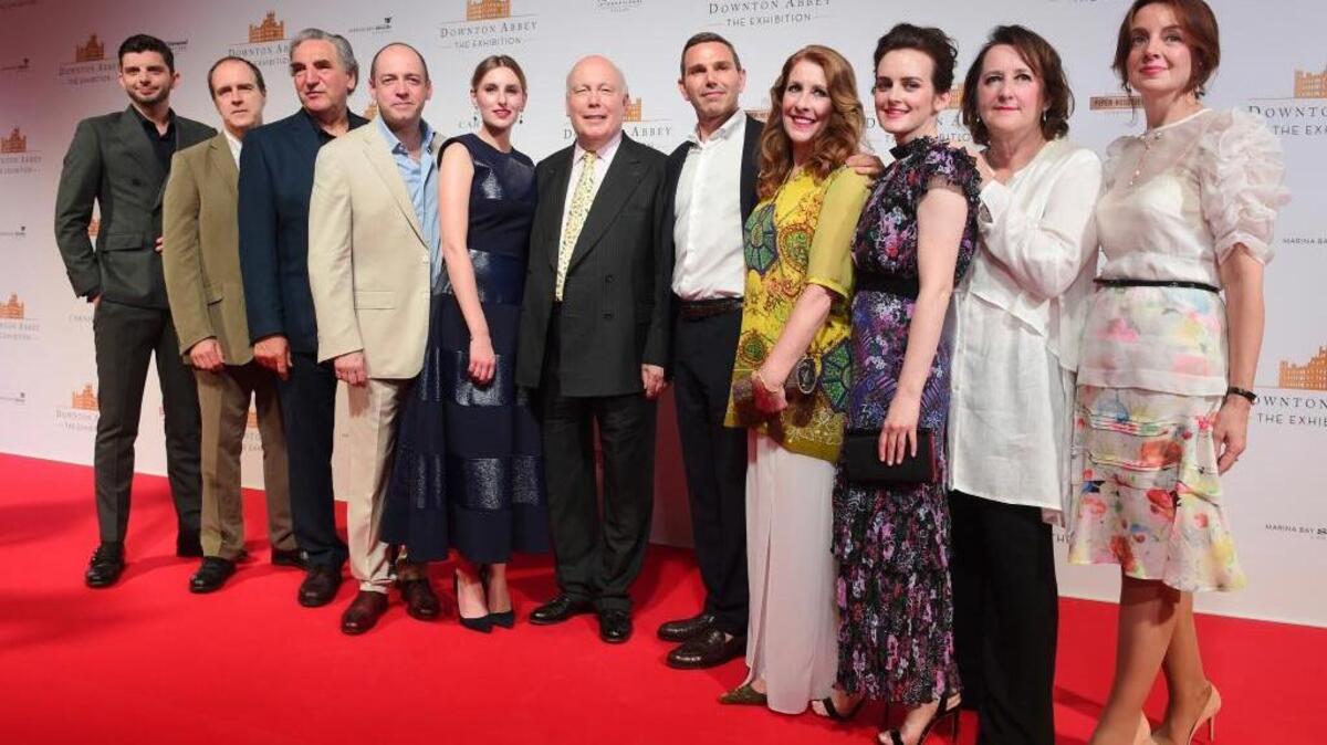 The cast and producers of “Downton Abbey” attend the launch of an exhibition about the television series on Wednesday in Singapore.