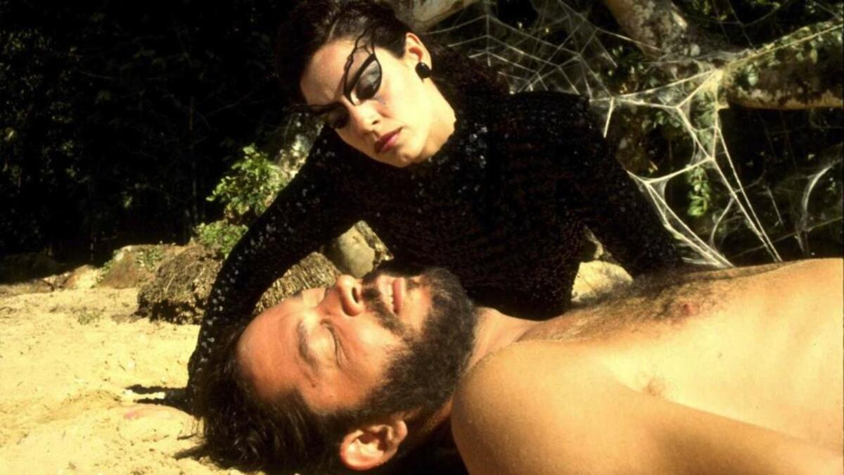 Raul Julia and Sonia Braga in the 1985 film “Kiss of the Spider Woman”