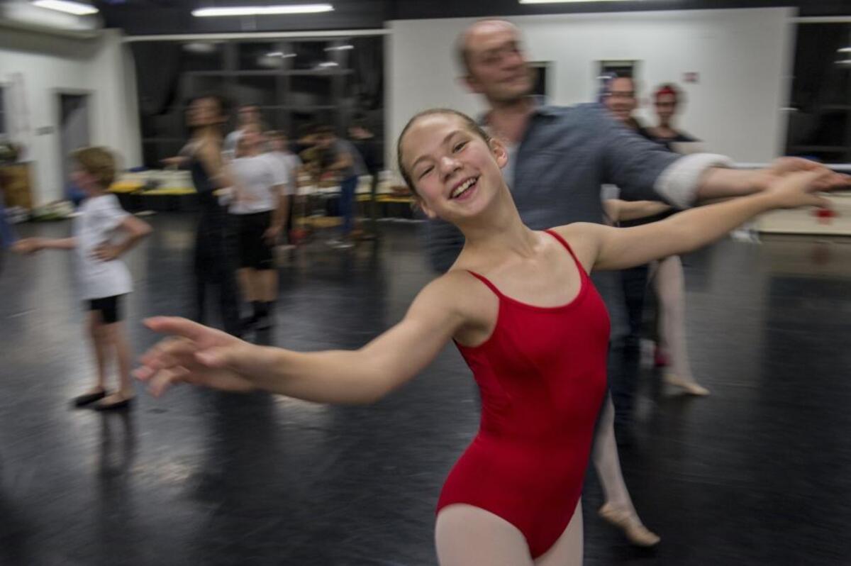 Mackenzie Welch, cast in the part of Clara, dances with Stefan Calka during rehearsal of the Sacramento Ballet’s production of “The Nutcracker” on Wednesday.