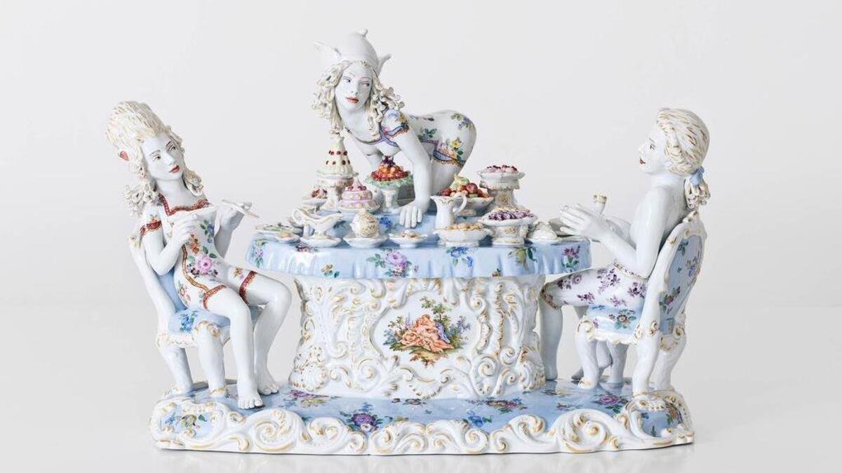A dinner table that’s part of “Forbidden Fruit” by Chris Antemann