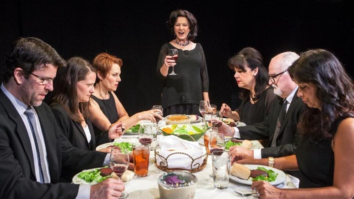 From left, Rick Eldridge, Taylor Burris, Amy Resnick, Janis Stevens, Jamie Jones, Harvey T. Jordan and Dena Martinez in “August: Osage County” at Capital Stage