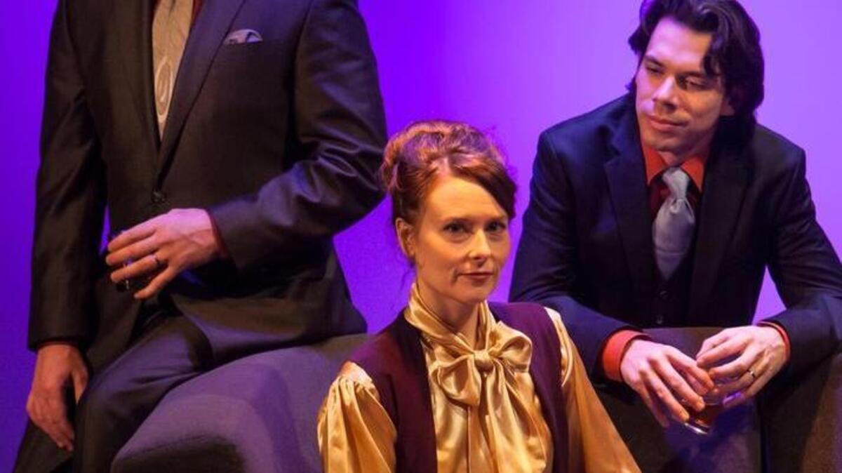 The Capital Stage production of “Betrayal” includes Michael Patrick Wiles, left, Elena Wright and Chad Deverman.