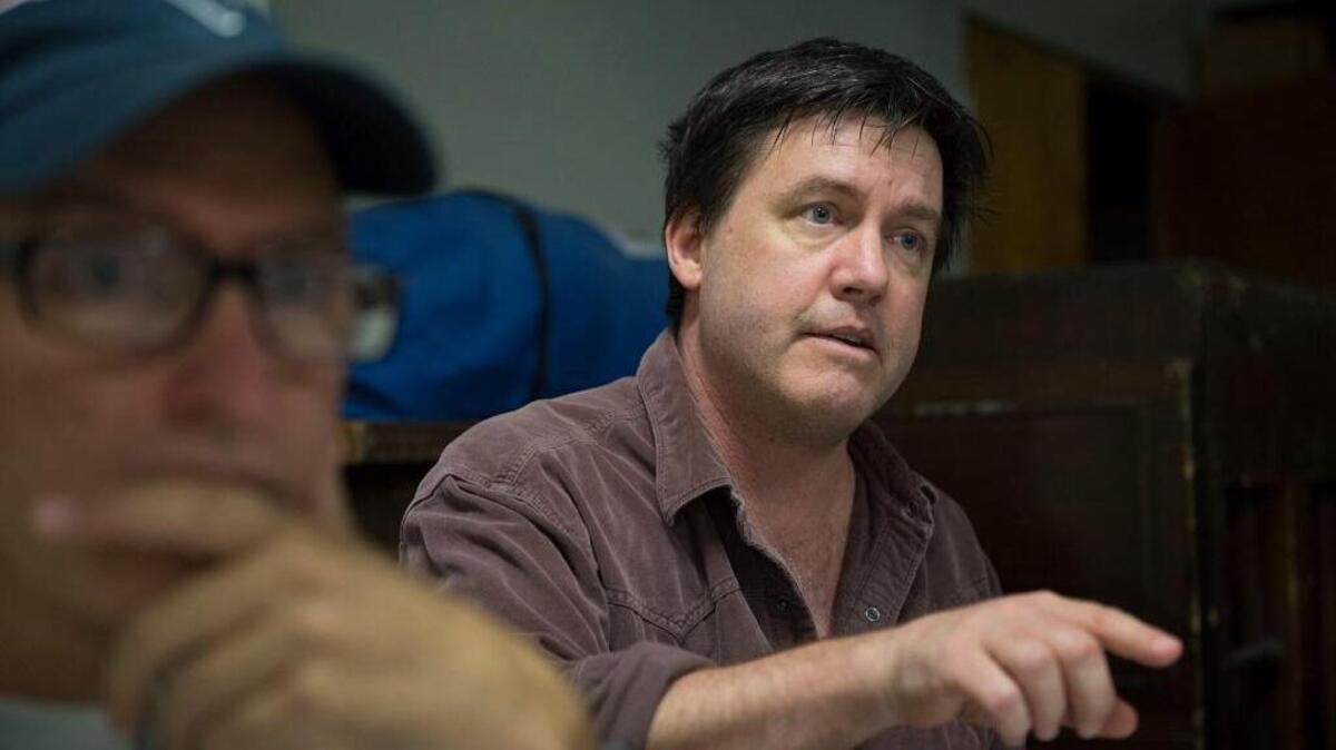 Writer Gary Alan Wright works with actors during a rehearsal of Sacramento Theatre Company’s world premiere of his play “Of Kites and Kings.”