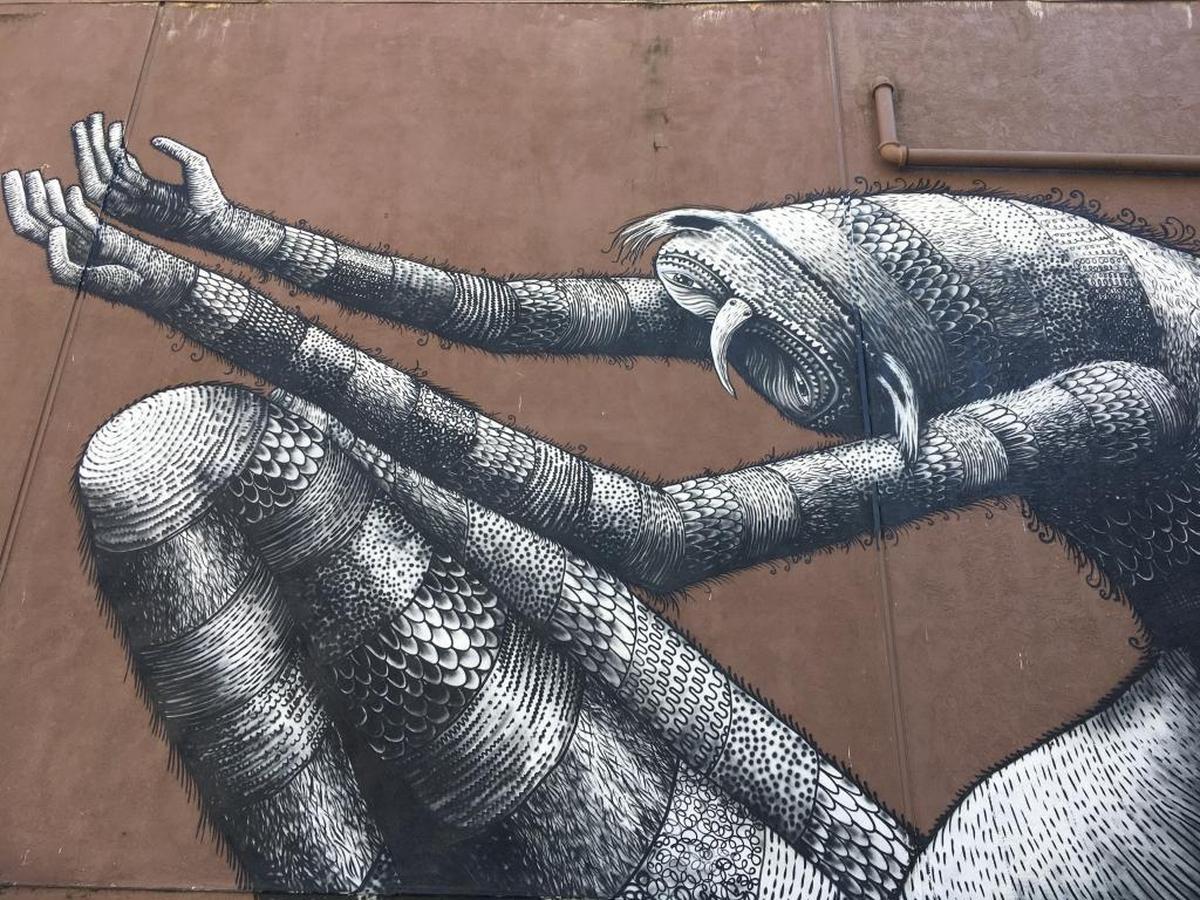 Mural by Phlegm on Improv Alley.