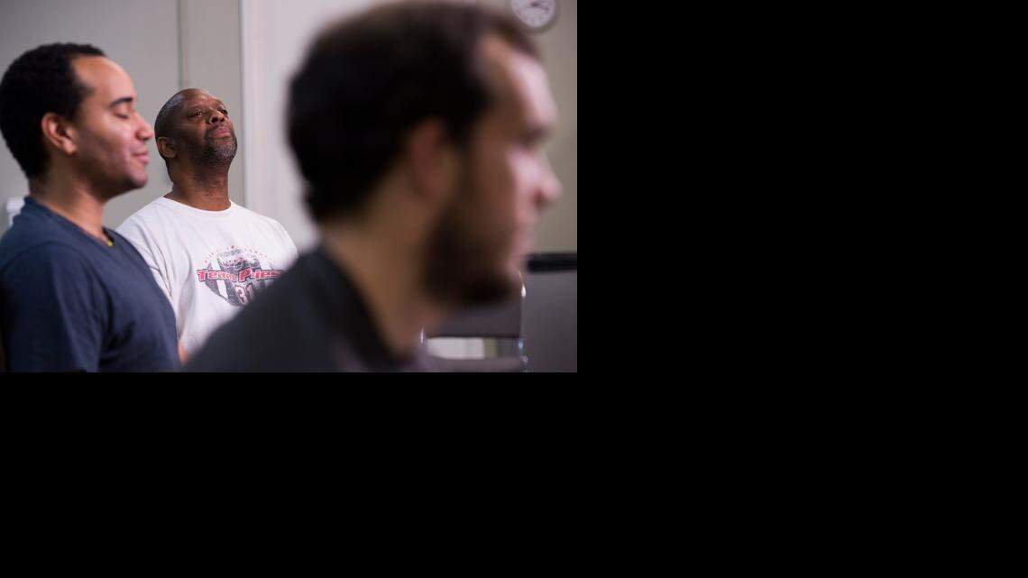 
Actors, from left, Anthony Simone, Michael J. Asberry and Sean Patrick Nill rehearse a scene from “The Whipping Man” at the Sacramento Theatre Company. The drama tells of a former Jewish slave owner having a Seder dinner with his former slaves.
