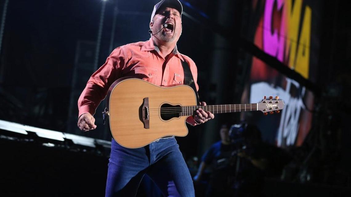Garth Brooks performs at the 2017 CMA Music Festival on June 8 in Nashville, Tenn. The country music star told a couple who got engaged at his concert Saturday in Oklahoma City that he’d pay for their honeymoon if they go to Hawaii.