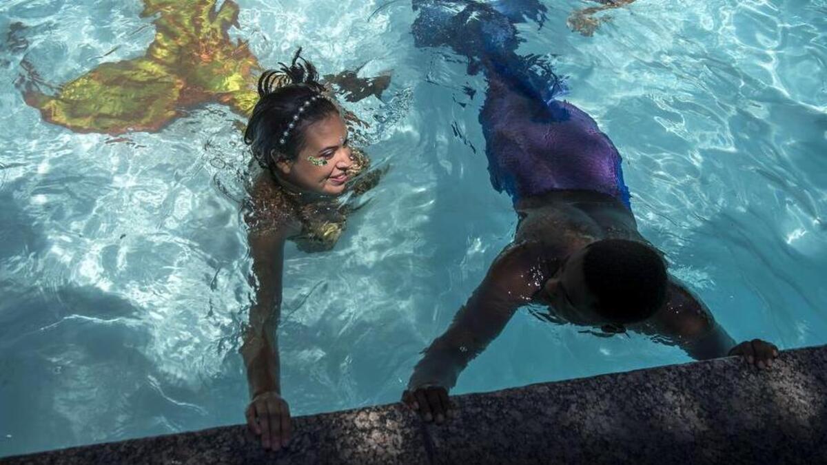 Members of The Sacramento Mermaids - Derrick Scott, of Sacramento, dressed as a merman, and Jenny “Elodea” Plant, of Turlock - at the Hyatt Children’s Mermaid Swim hosted by Dive Bar Mermaids and The Sacramento Mermaids in 2016.