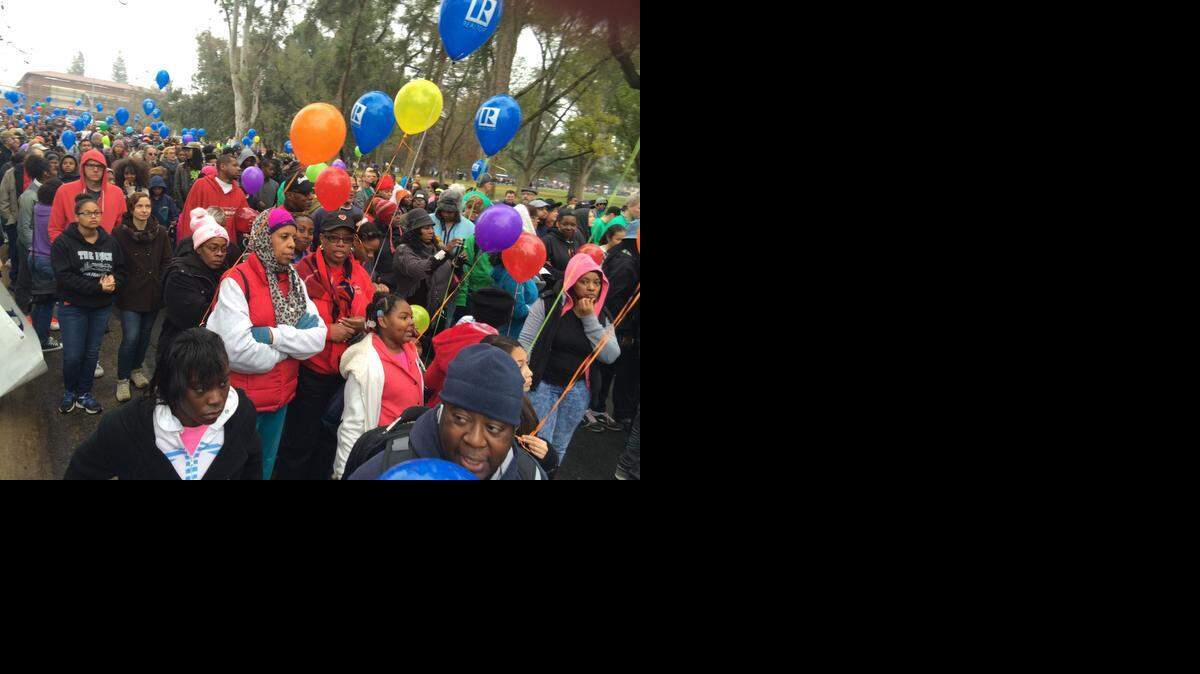 
Organizers estimated that 27,000 people participated in the marches in Sacramento. Here, two groups merge at Sacramento City College on their route to Sacramento Convention Center for a Diversity Expo. Another march started in North Sacramento. 

