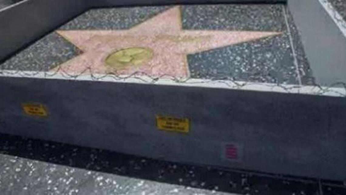 Wall goes up around Donald Trump’s Hollywood star