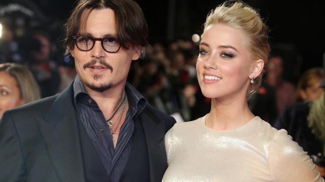 Video shows Johnny Depp tossing wine glass, yelling at Amber Heard