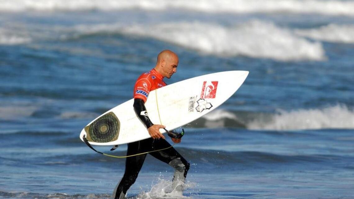 Surf star Kelly Slater rides to victory Tahiti in perfect fashion