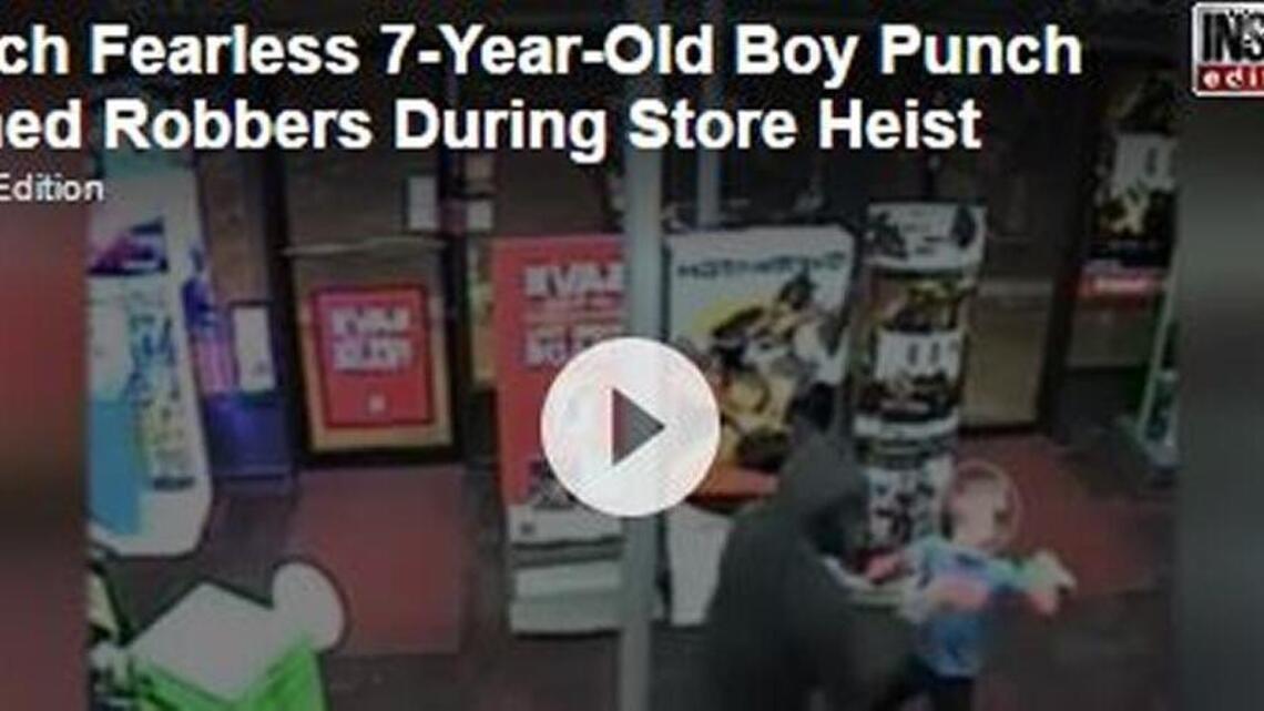 Watch fearless boy, 7, punch armed robbers during GameStop store heist