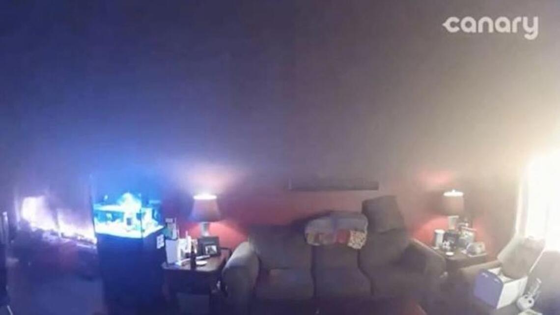 Security camera inside home shows destruction wrought by Alberta wildfire