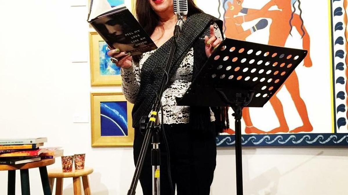Ana Castillo reads one of her poems at the Sacramento Poetry Center.