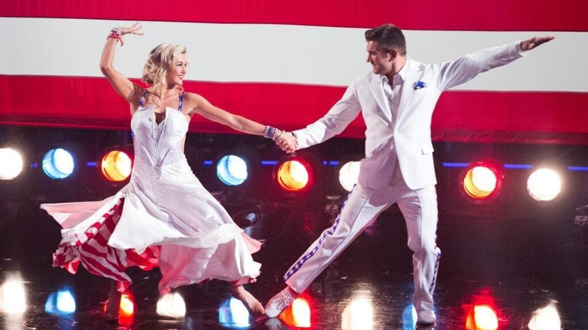 
This photo provided by ABC shows, Lindsay Arnold, left, and Alek Skarlatos, in an episode of Dancing With the Stars, Tuesday, Sept. 22, 2015, 9:00-11:00 p.m. ET, on the ABC Television Network. Skarlatos is back on TVs "Dancing with the Stars," days after the mass shooting at his Oregon college. On the Monday, Oct. 5, 2015 episode, an emotional Skarlatos dedicated his performance to the community of Roseburg, Oregon, where nine people were killed last Thursday.

