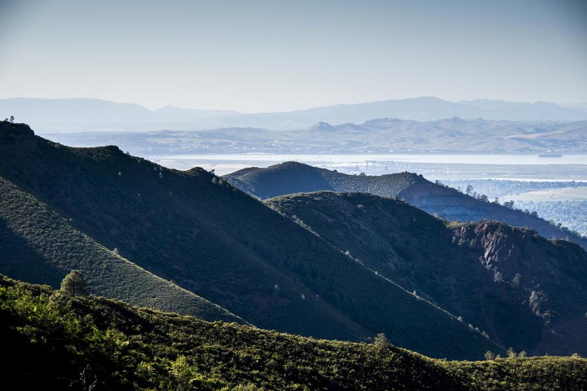 The view of the San Francisco East Bay area along the single track Middle Trail during a hike of Donner Canyon-Eagle Peak Loop at Mount Diablo State Park in Clayton, Calif.