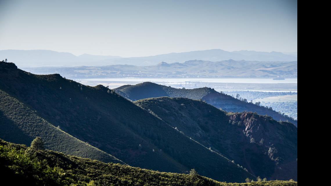 The view of the San Francisco East Bay area along the single track Middle Trail during a hike of Donner Canyon-Eagle Peak Loop at Mount Diablo State Park in Clayton, Calif.