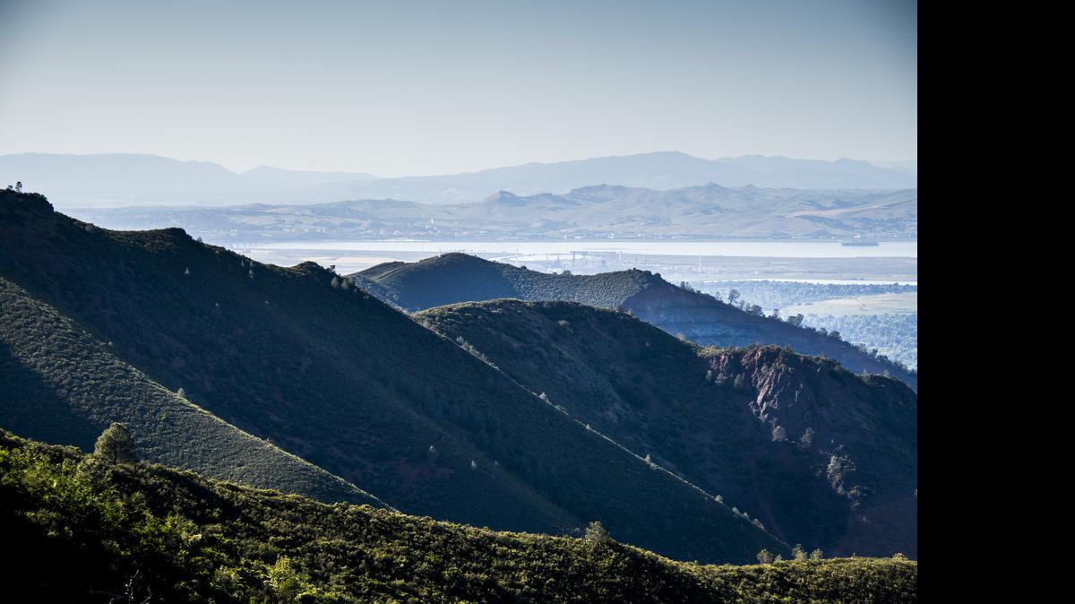 The view of the San Francisco East Bay area along the single track Middle Trail during a hike of Donner Canyon-Eagle Peak Loop at Mount Diablo State Park in Clayton, Calif.