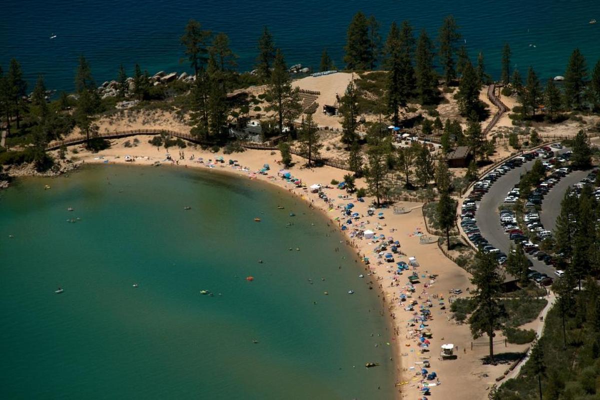 FILE - Sand Harbor as seen from the Flume Trail near Incline Village, Nev. on Thursday, June 27, 2013. Beach space is more limited this summer, as Lake Tahoe is nearly full to its maximum legal limit.