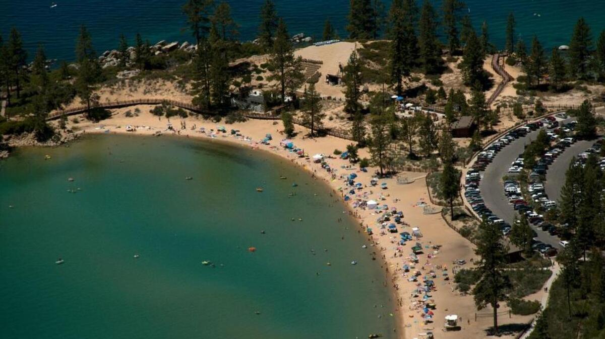 FILE - Sand Harbor as seen from the Flume Trail near Incline Village, Nev. on Thursday, June 27, 2013. Beach space is more limited this summer, as Lake Tahoe is nearly full to its maximum legal limit.