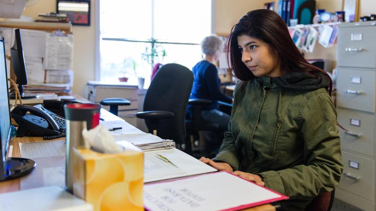 Nubia Flores Miranda, 18, works part-time at Family Paths, a counseling and mental health organization in Oakland, Calif., on Friday, January 29, 2016. Miranda said she became interested in a career in mental health after she started experiencing depression and anxiety her freshman year at Life Academy of Health and Bioscience.