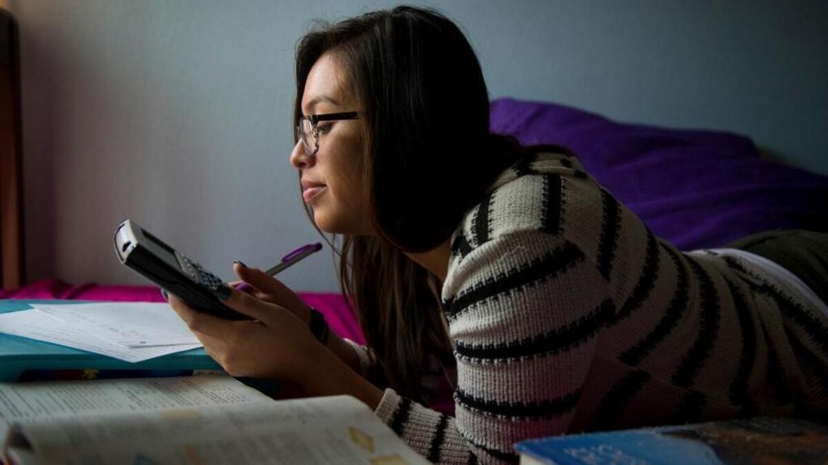 Featured in the 2014 Book of Dreams, Melanie Ocon works on homework at home in South Sacramento. She is the first in her family to graduate from high school and if all goes as planned, attend college. The Center for Land-Based Learning asked the Book of Dreams readers to help Ocon and other college-bound students by funding "Laptop and Luggage Scholarships" that would provide a laptop and other college essentials for 10 deserving students.