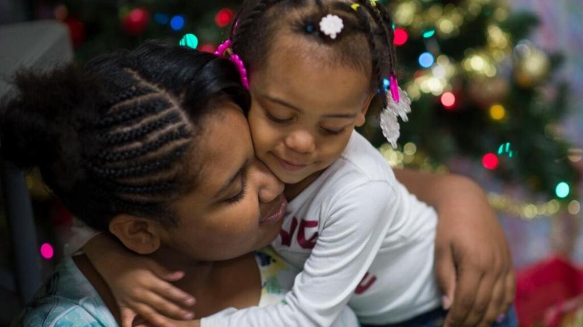 Comfortable clothes are welcome holiday gifts for shelter children