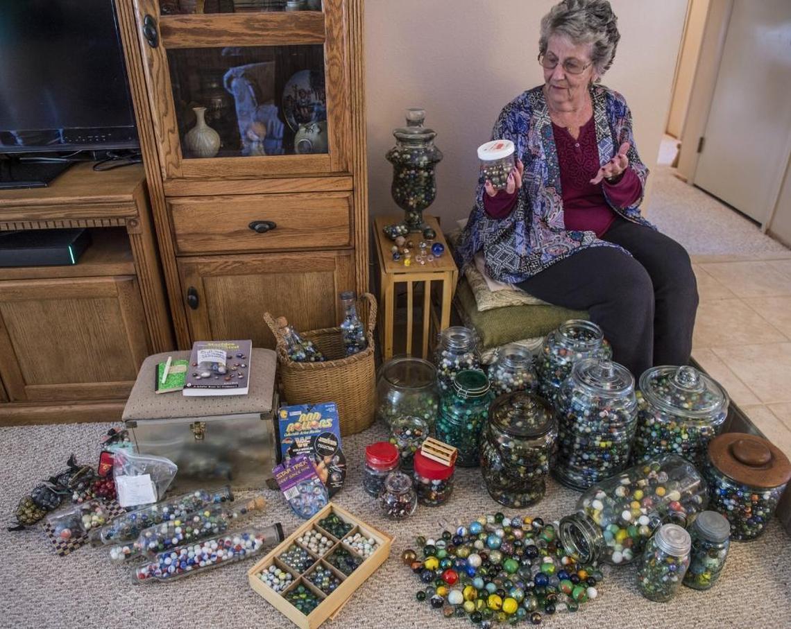 Judy Headley shows off her collection of 20,824 marbles in Citrus Heights.