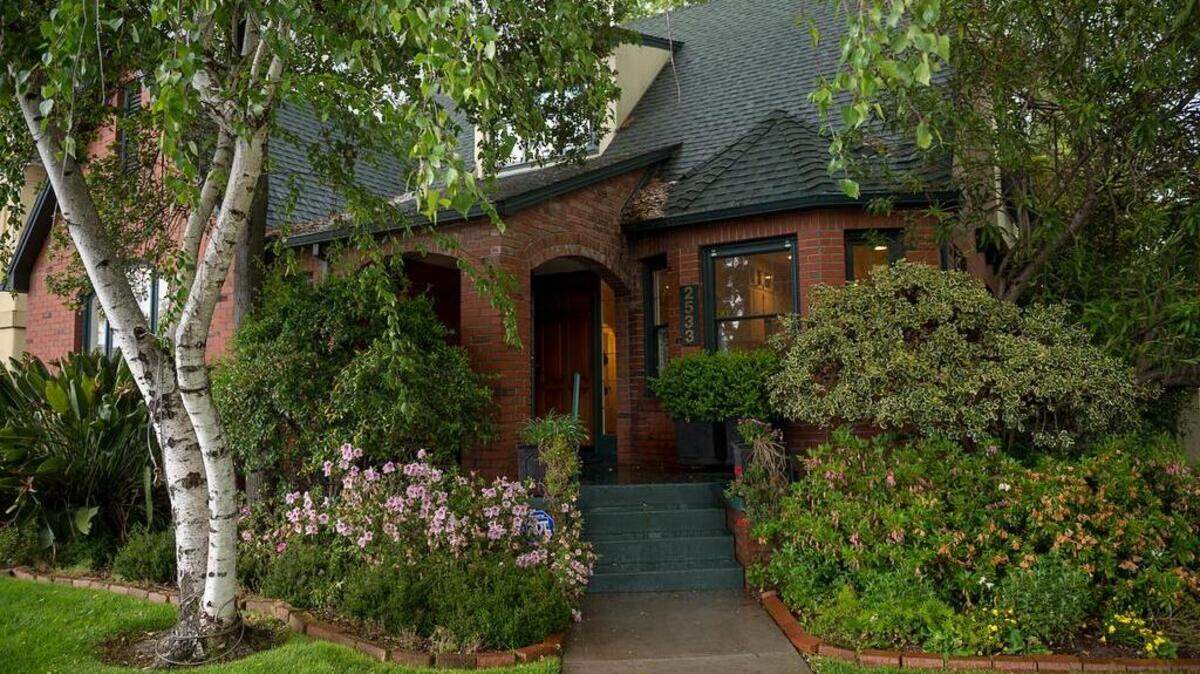 Janet Carlson and John Bailey have restored their brick Curtis Park house on Monday April 16, 2018 in Sacramento , Calif. This dog-friendly house is going to be the featured home on the annual Curtis Park tour.