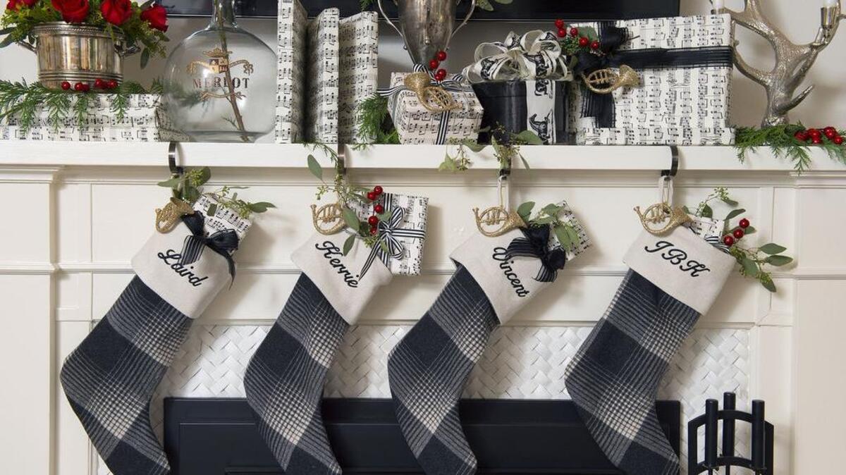 Fresh greenery decorates the mantle at the home of Kerrie Kelly, featured in the Sacred Heart tour.
