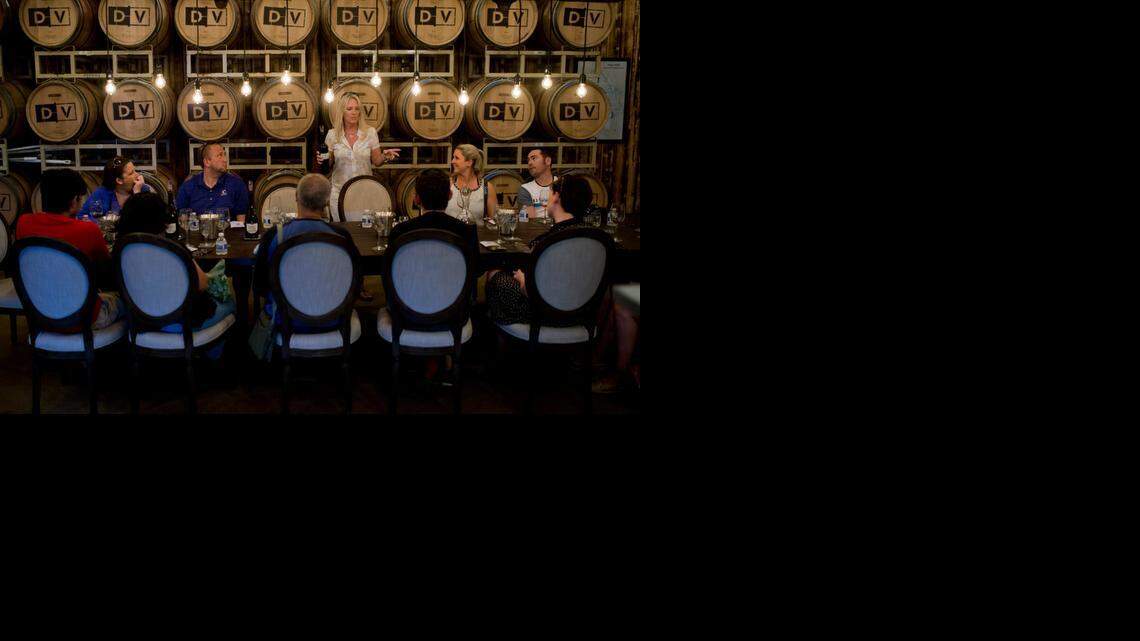 
Stacy Wagner pours wine and tells the story of the beginnings of Dahl Vineyards, one of four stops on the Napa Valley Wine Trolley’s six-hour journey through wine country.
