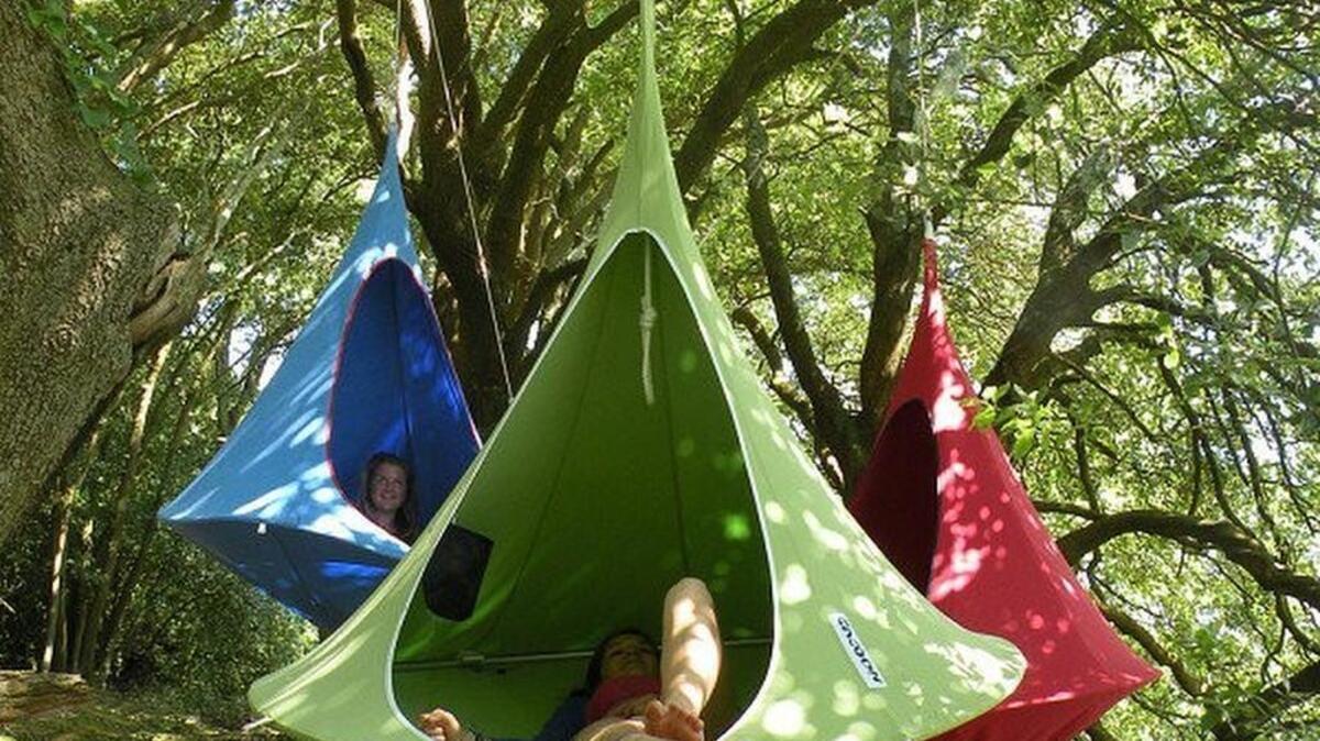 
The Cacoon Hanging Lounge is a hybrid hammock/tent. 
