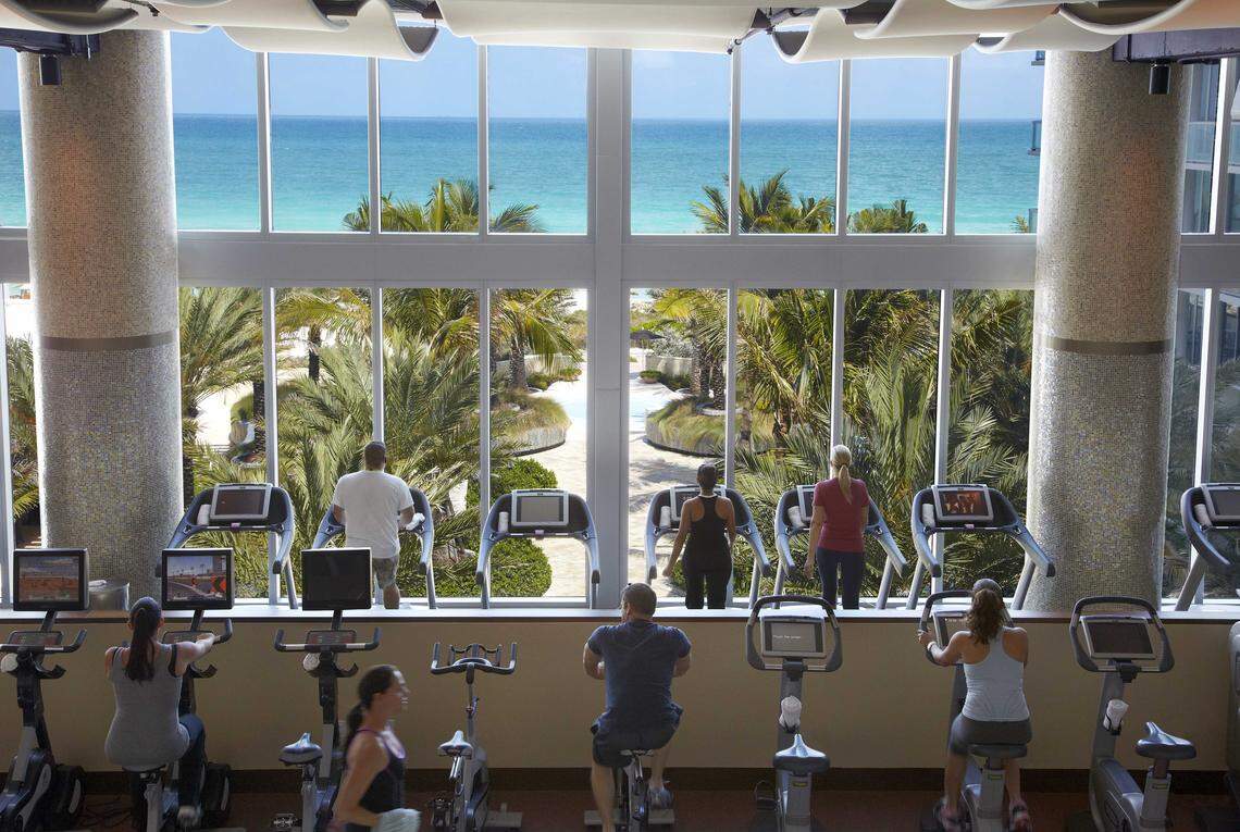Oceanfront cardio with panoramic views at Carillon Miami Wellness Resort’s expansive fitness center.