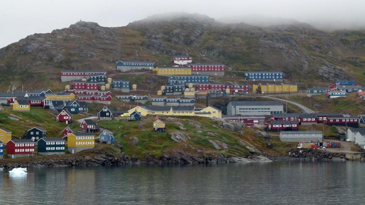 Tasiilaq a colorful hamlet in Greenland: The photographer: Lou Padgug of Sacramento
Behind the lens: We recently completed a cruise of the North Atlantic from Edinburgh, Scotland to Norway, Iceland and Greenland. Our port in Greenland was the town of Tasiilaq. With just over 2,000 inhabitants, it is the most populous community on the eastern coast, and the seventh-largest town in Greenland. The fog and low clouds obscured the surrounding mountains but accentuated the remoteness of this town.
