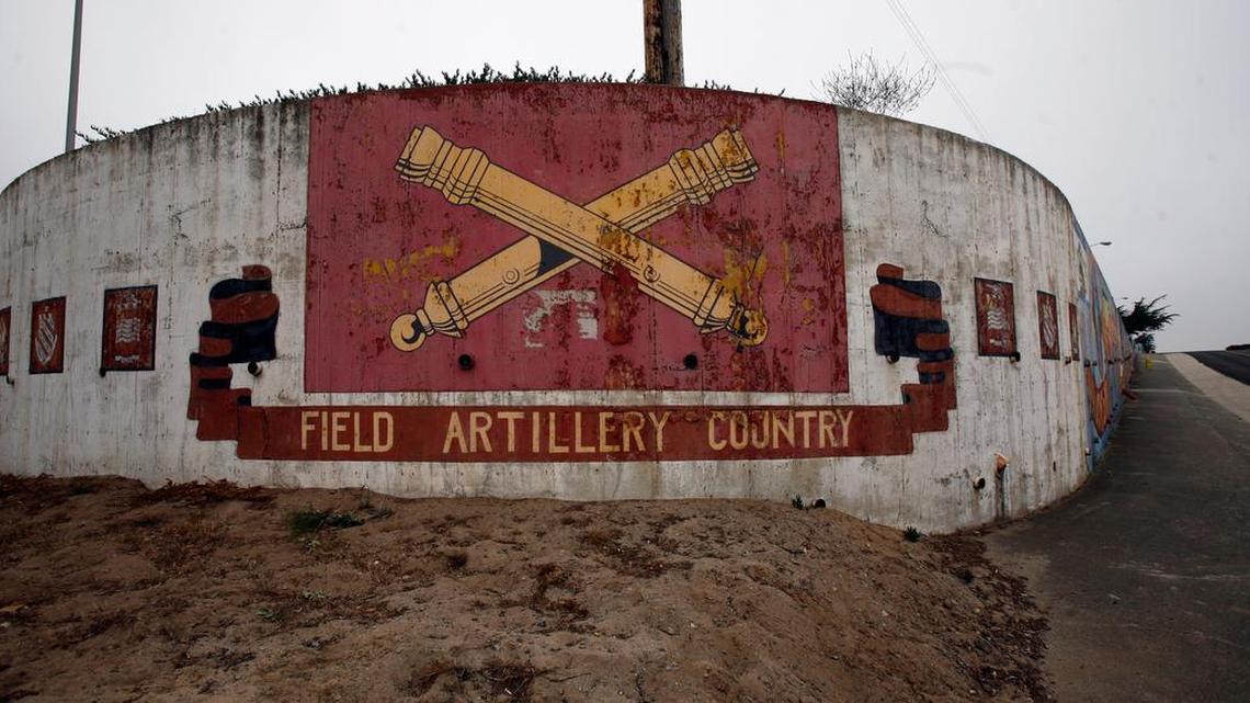 Faded military murals are scattered throughout the abandoned infrastructure of Fort Ord in Monterey Bay. This mural is on the California State University, Monterey Bay, campus.