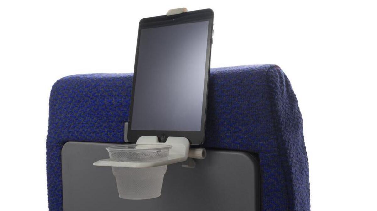 The Airhook, which attaches to an airplane seatback, cost $22.