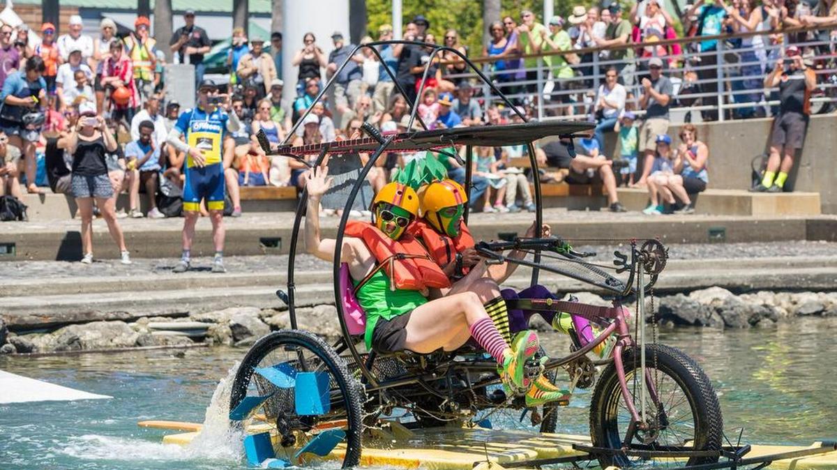Competitors pedal hard during the amphibious bike race at 2016’s Jack London Square Pedalfest event.