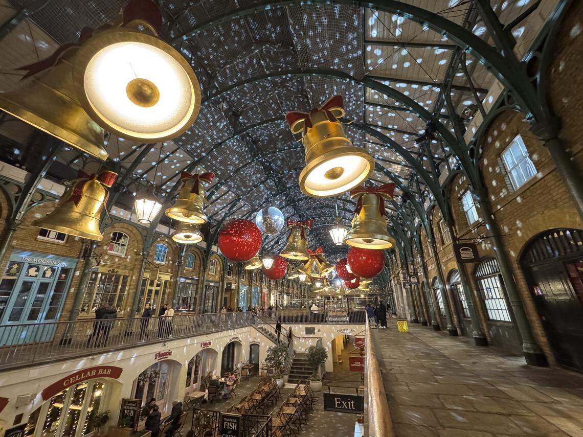 Covent Garden dressed in twinkling lights and festive decorations for the season.