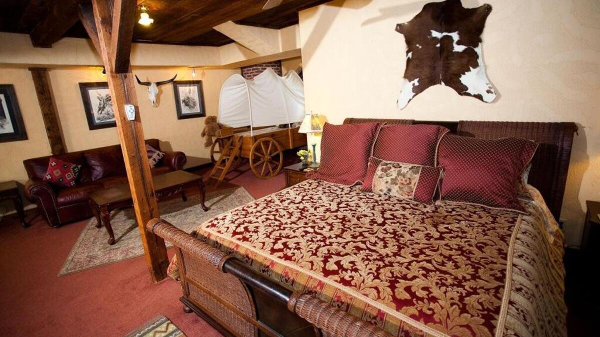 Some rooms at the Southern Cross Guest Ranch in Madison, Ga., are decorated in a Western theme.
