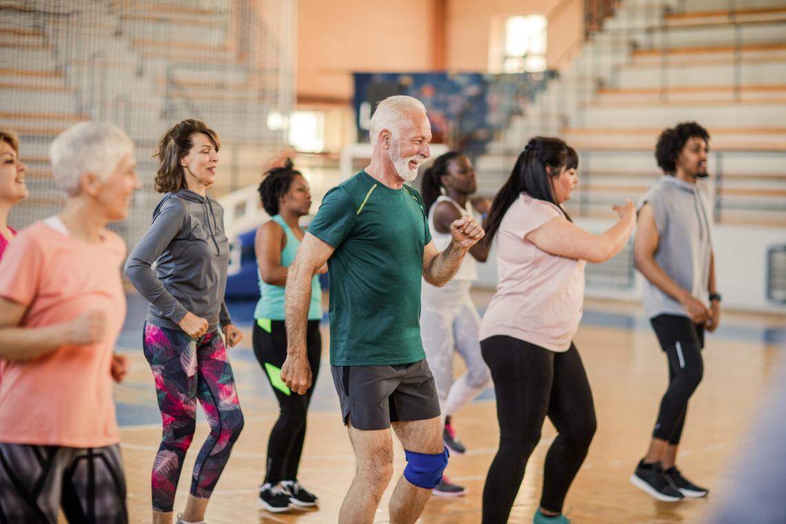 Seniors at a dance exercise class.