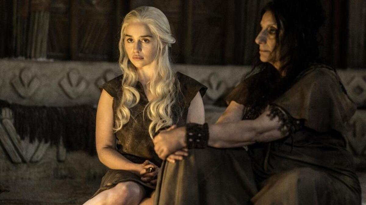 Emilia Clarke as Daenerys Targaryen and Souad Faress as the High Priestess of the Dosh Khaleen in HBO's "Game of Thrones."