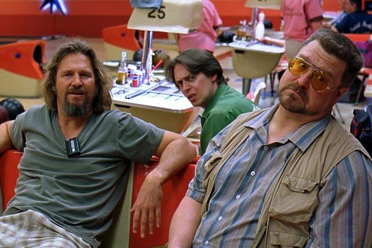 Jeff Bridges as The Dude, left, hangs out at the bowling alley with his buddies Walter (John Goodman) and Donny (Steve Buscemi) in “The Big Lebowski.”