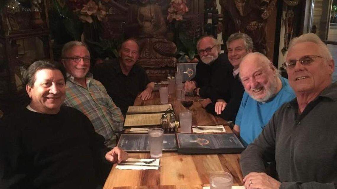 Counterclockwise, from left: Former Tower executives Stan Goman, Mike Farrace, John Thrasher, Steve Nikkel, Ken Sockolov, Russ Solomon and Bob Delanoy gather for dinner at Tower Cafe in October 2017.