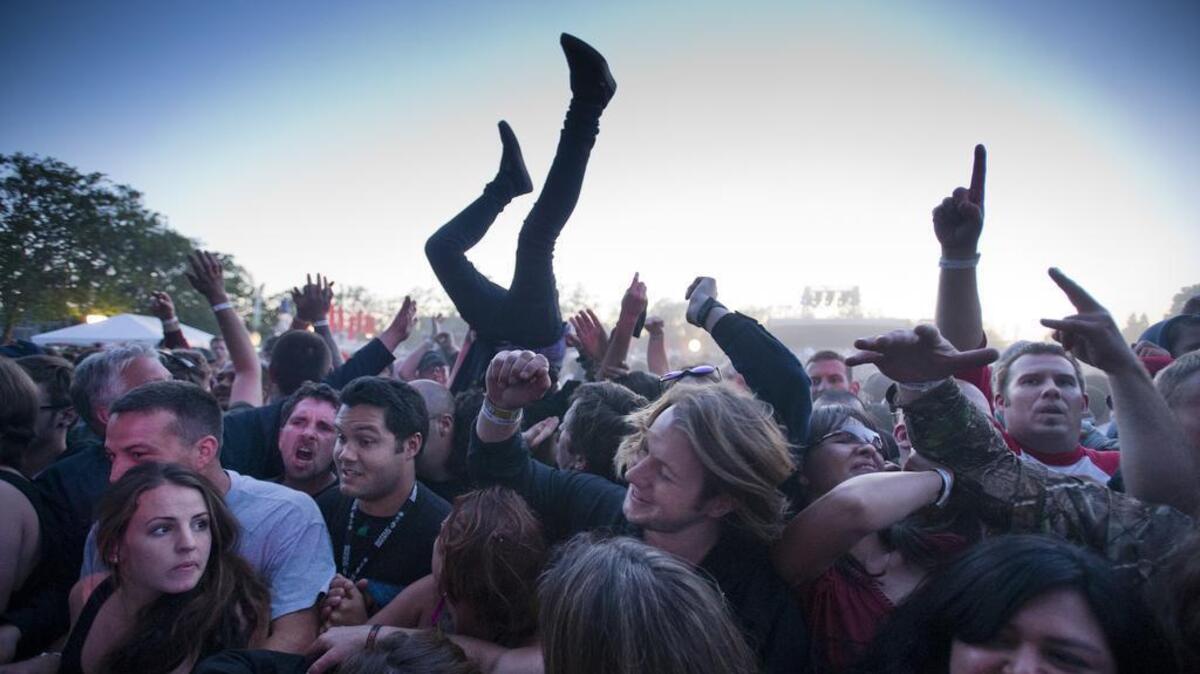 Fans body surf during the BottleRock festival at the Napa Valley Expo on May 9, 2013 in Napa, Calif.