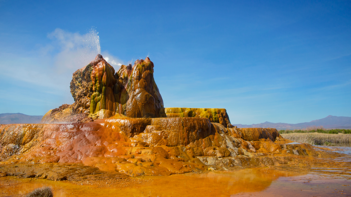 Fly Geyser was created accidentally in 1964 when an effort to harness geothermal energy was aborted. The improperly capped well has been spewing hot mineral-rich water ever since.